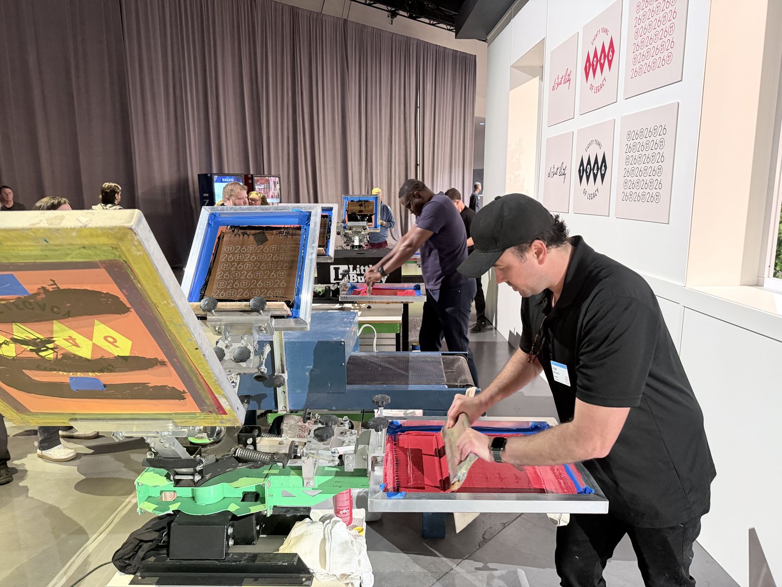 Merch Troop live screen-printing station running at a Pittsburgh event